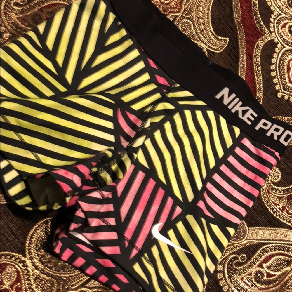 Nike Women's Black, Yellow, and Pink Striped Shorts